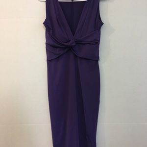 Purple Body-con dress with knot detail.